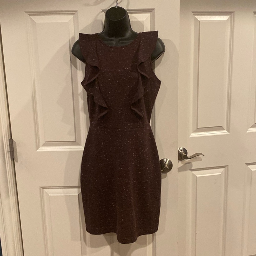 Small purple cupcakes and cashmere sleeveless dress with ruffles and back zip